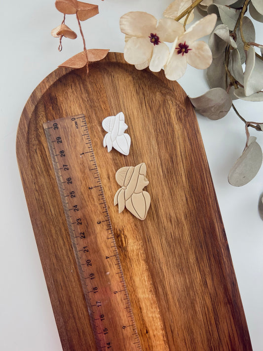 Girl in hat clay cutter B9